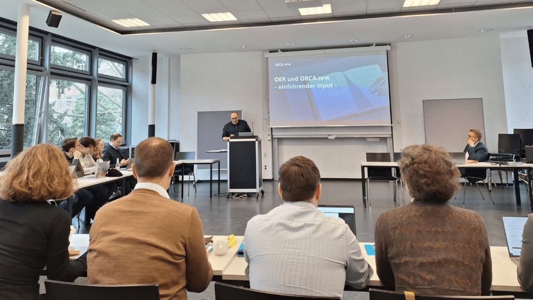 Dr. Joachim Preusse spricht vor den Teilnehmern der OER-Tagung in Münster.